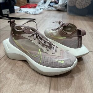Nike Tan and Green Athletic Shoes Sleek Design